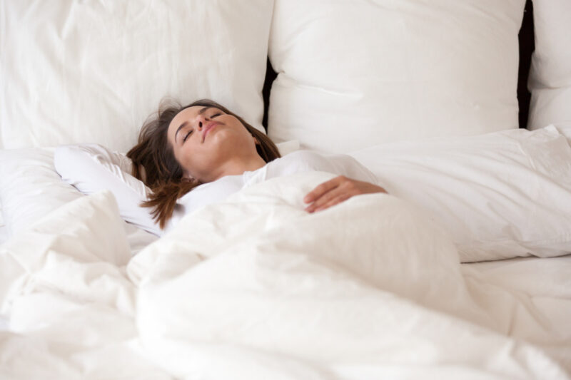 Do These 5 Yoga Poses Before Bed If A Meal Has You Bloated